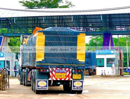 Laos relies heavily on foreign markets and ports. A truck prepares to cross from Thailand into Laos PDR