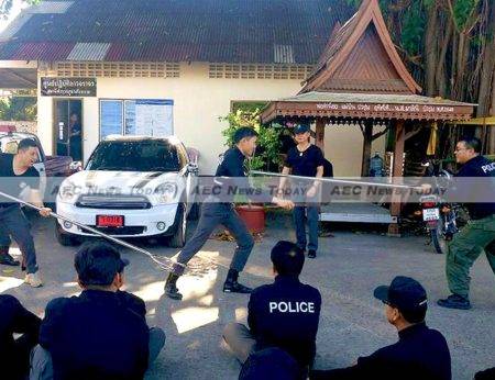 Thai police are shown how to subdue an offender armed with a long-bladed weapon in January