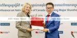 National Bank of Canada's Karen Leggett and ABA Bank's Askhat Azhikhanov announcing the increased Canadian shareholding.