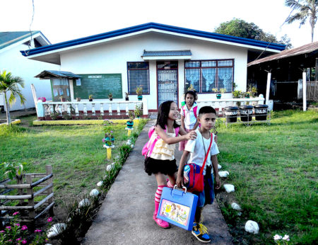Students going home from a school in Leyte Province. The Department of Education will receive a 31% boost in funding from the the 2017 Philippine budget