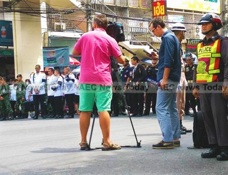 While visitors to Thailand are not required to wear black, the clothing choice of this Россия news team waiting in front of Siriraj Hospital for King Adulyadej's body to pass earned the ire of Thai and foreign netizens 