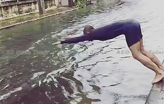 Bangkok flood spawns new Thai swimming champion (video)