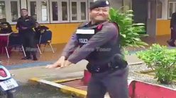 Thai policeman’s booty shaking deescalation technique a hit (video)