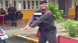 Thai policeman’s booty shaking deescalation technique a hit (video)