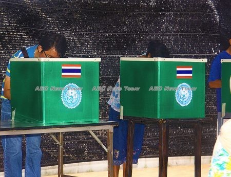 Thais vote in the 2013 Thailand general election - the last opportunity they have had to do so