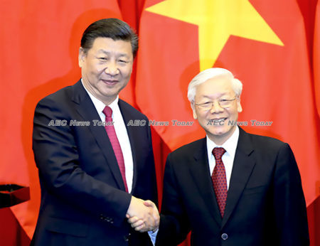 President Xi Jinping of China gretas General Secretary of the CPV Central Committee Nguyễn Phú Trọng
