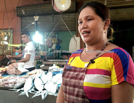 Cantilan market fish stall owner and Cantilan Bank client Margilyn Cosmiano: the app has enabled me to set up the businesses that I had planned, and I have been able to send my children to school
