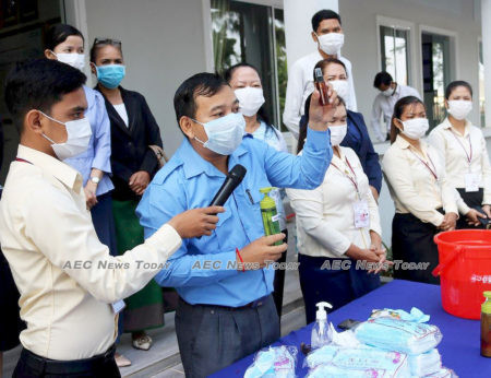 School students in Cambodia are shown the correct hand hygiene and barrier protection methods to help prevent the spread of Wuhan coronavirus