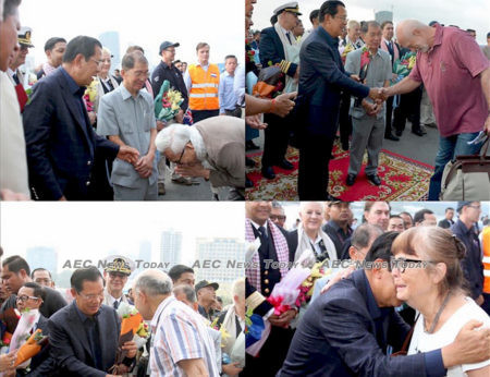 Cambodia Prime Minister Hun Sen greets passengers disembarking from the Westerdam on Friday