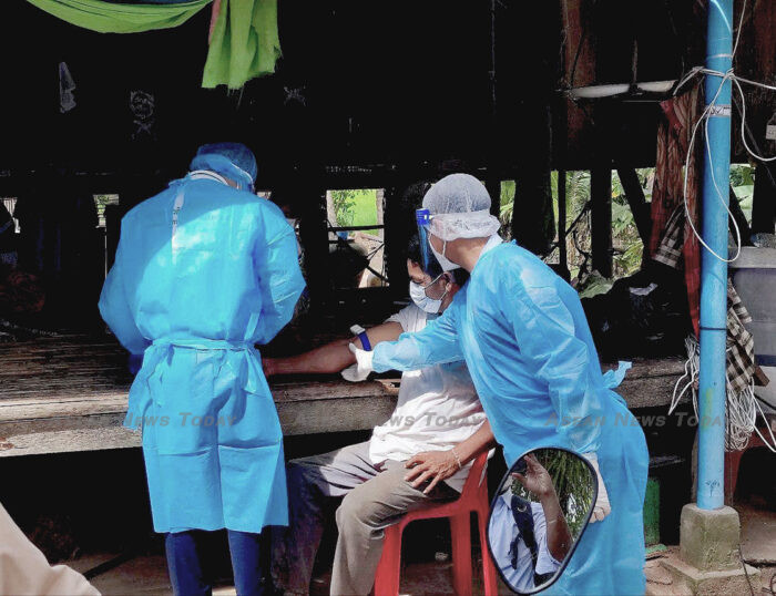 Cambodia CDC staff take a pathology sample for testing for Avian Influenza A (H5N1) from a resident of Preah Kampong Thom commune, Kampot